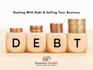 DEBT spelled out in blocks